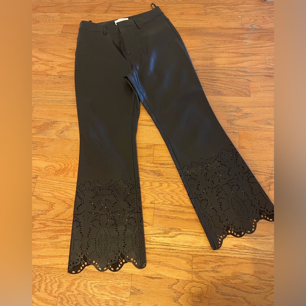 Anthropologie Laser Cut Faux Leather Flare Pants